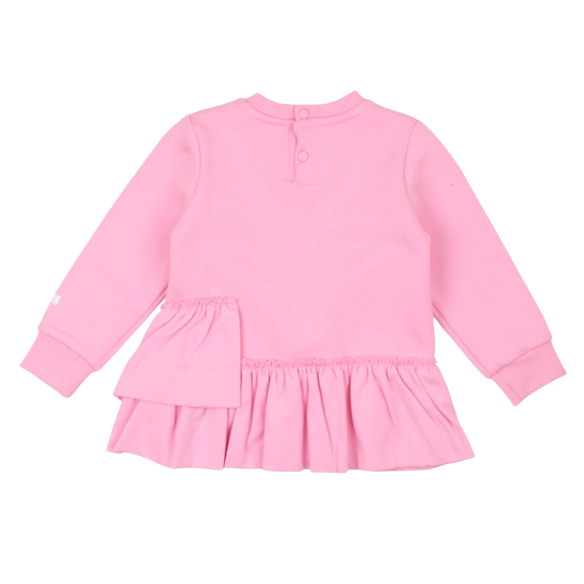 Pink dress with ruffled skirt on a white background
