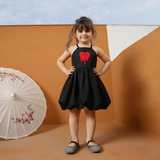 Black puffed dress with heart emblem (Girl)