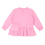 Pink dress with ruffled skirt on a white background